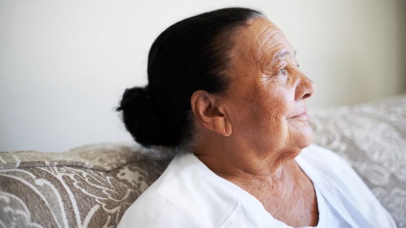 People-older-woman-looking-into-distance-agedcare