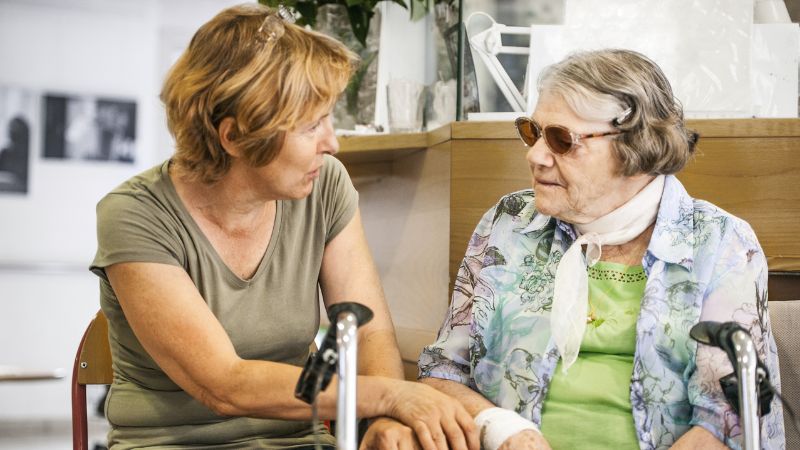 People-older-woman-with-walking-frame-agedcare