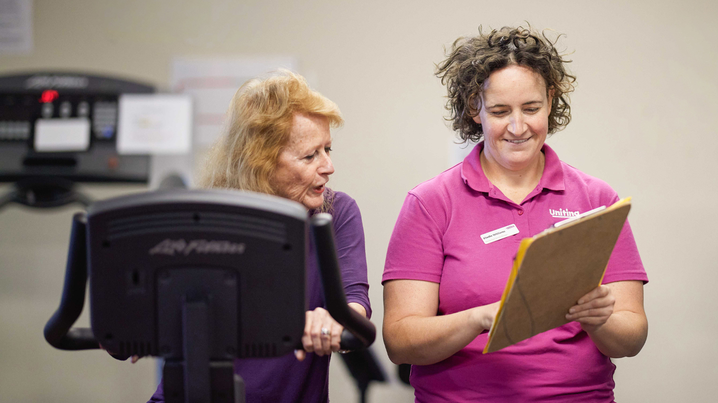 Uniting staff accessing a senior who is exercising