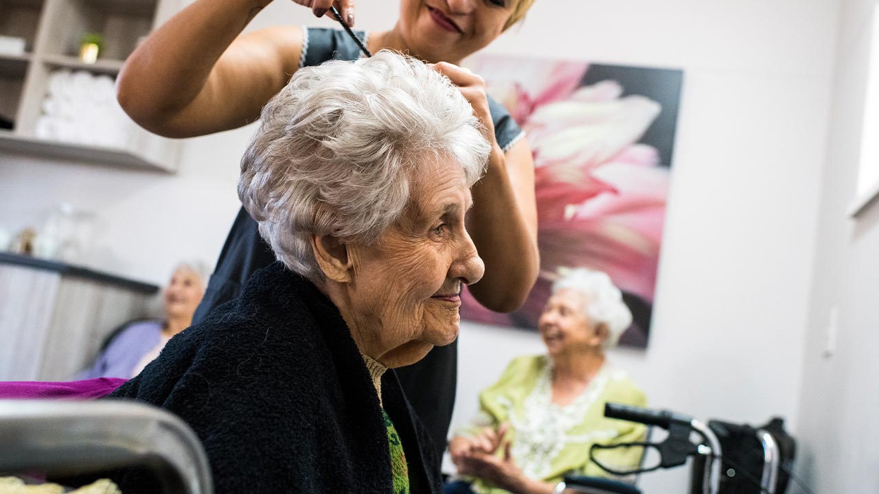 An older woman in a hair dressing salon