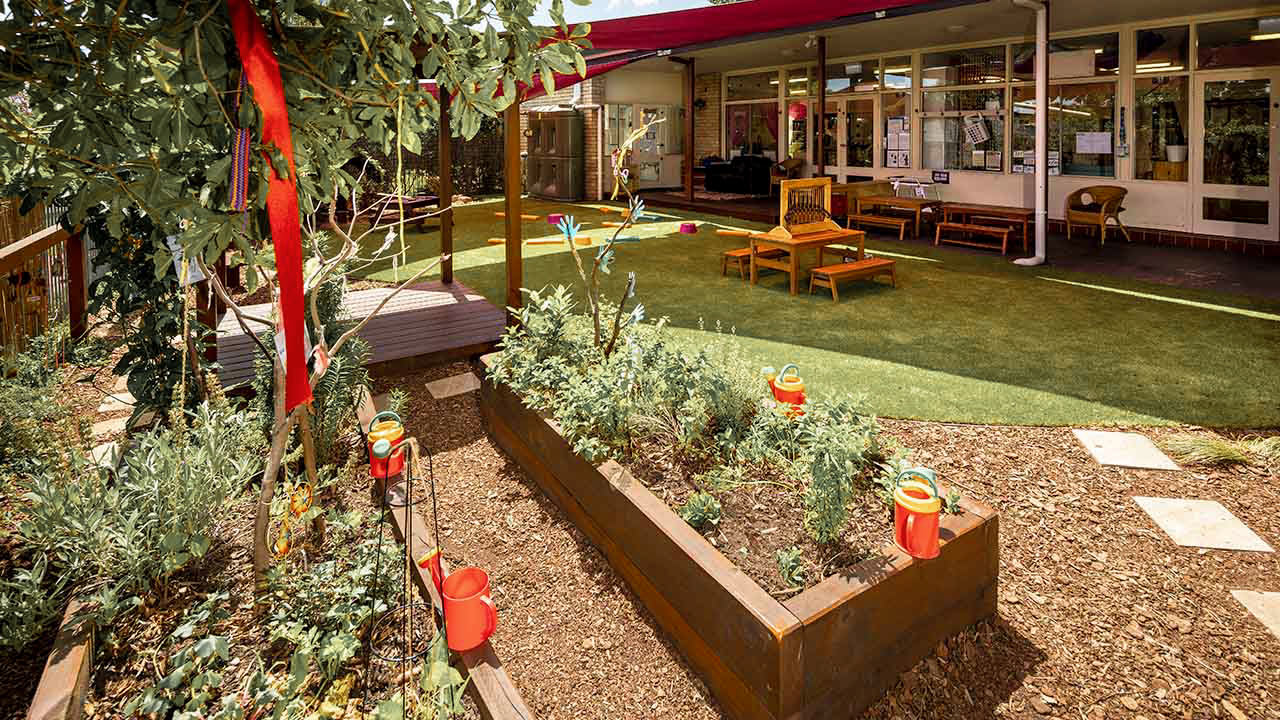 Herb garden and watering cans.