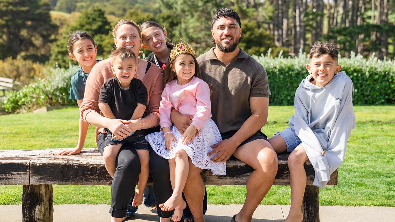 Large multicultural family smiling