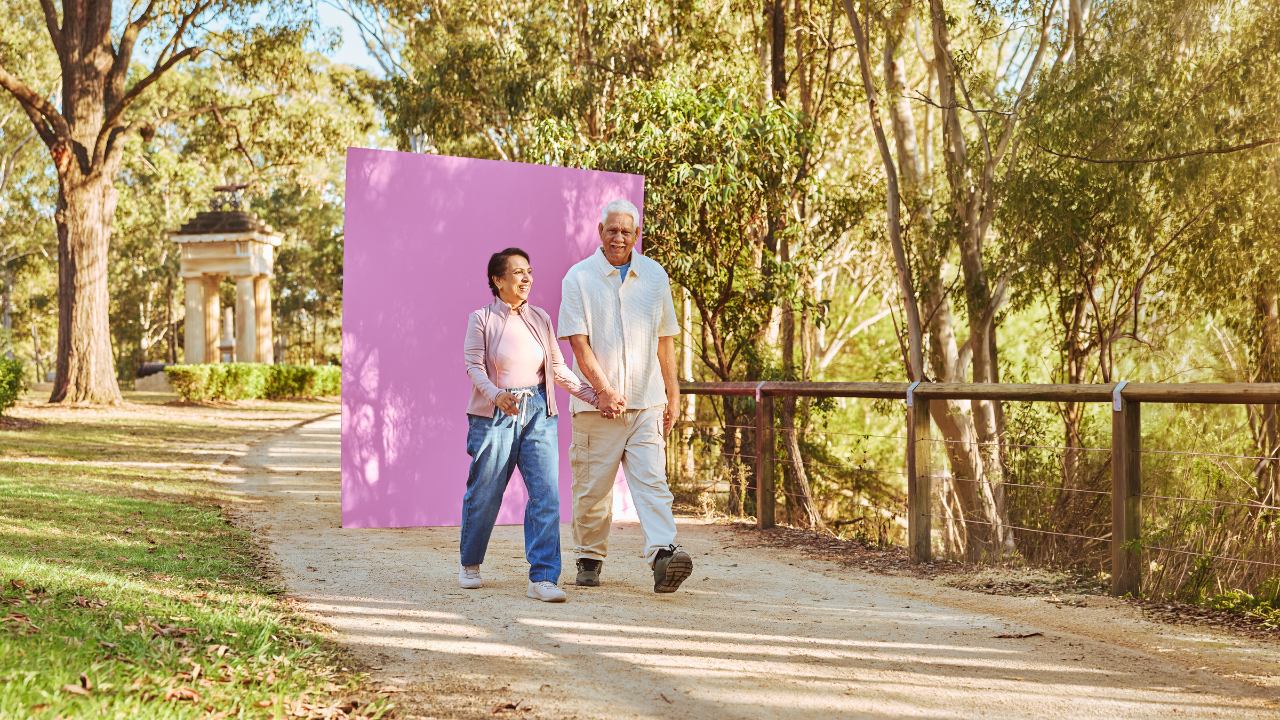 Man and woman walking in the park